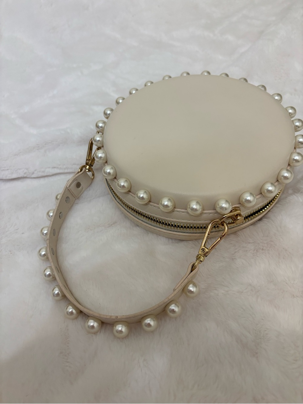 Pearl-Trim Round Wristlet Bag in Cream